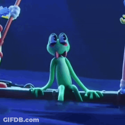 Green Frog With Bow Tie Sitting On Log GIF