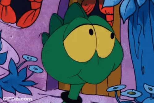 Green Frog With Yellow Eyes GIF