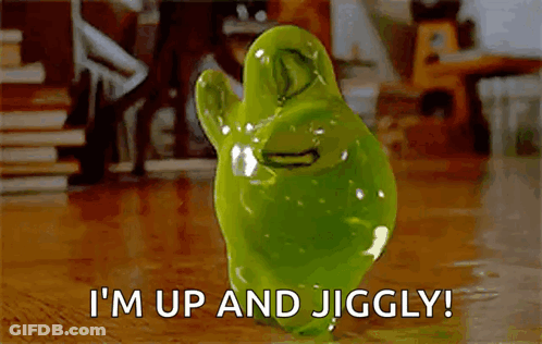 Green Ghost Standing On Wooden Floor GIF