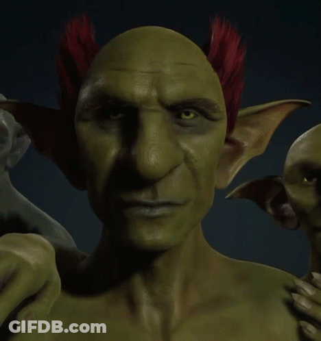 Green Goblin With Red Hair On Ears GIF