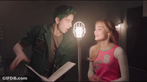 Green-Haired Man And Pink-Shirt Woman With Letter S GIF
