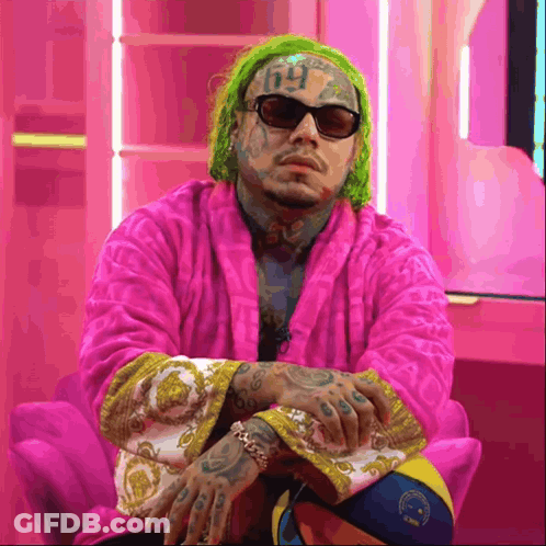 Green-Haired Man With Sunglasses And Number 69 GIF