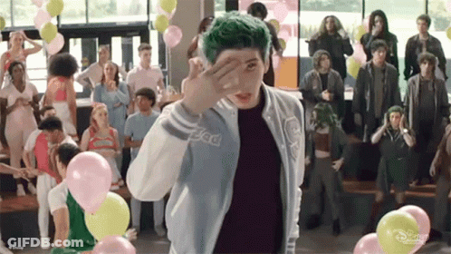 Green Haired Person Standing Before Crowd GIF