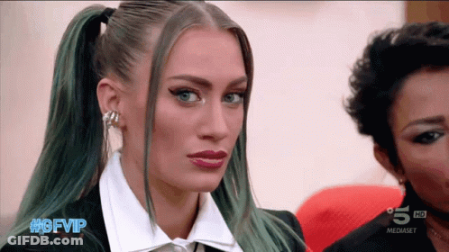 Green Haired Woman Looking At Camera #Gfvip GIF