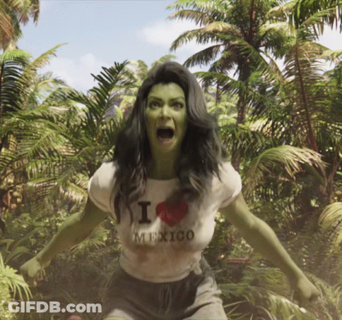Green-Haired Woman Wearing I Heart Mexico Shirt GIF