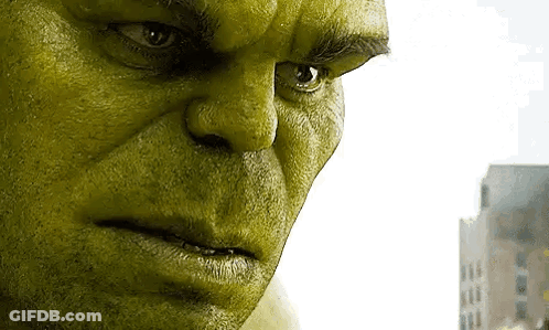 Green Hulk Close Up With Serious Expression GIF