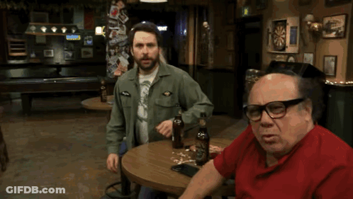Green Jacket Man With Red Arrow Saying Who Is He GIF