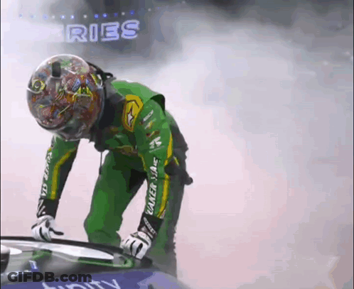 Green-Jacketed Man With Helmet Beside Car Saying Ries GIF