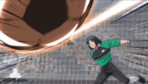 Green Jersey Soccer Player Kicking Ball With Japanese Flag GIF