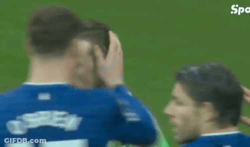 Green Jersey Soccer Player Screaming Near Another Player GIF