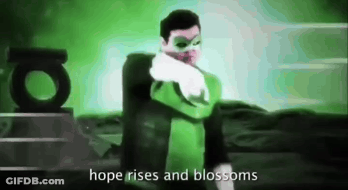 Green Lantern Costume Says Hope Rises And Blossoms GIF