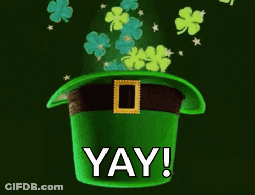 Green Leprechaun Hat With Clovers Saying Yay GIF