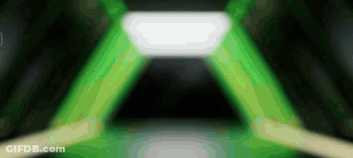 Green Light Through Dark Room With White Center GIF