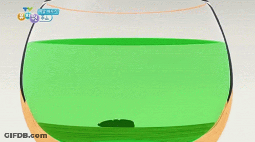 Green Liquid In Glass With Korean Writing GIF