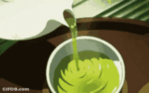 Green Liquid Pouring Into White Cup GIF