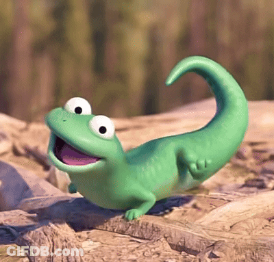 Green Lizard With Purple Tongue On Rock GIF