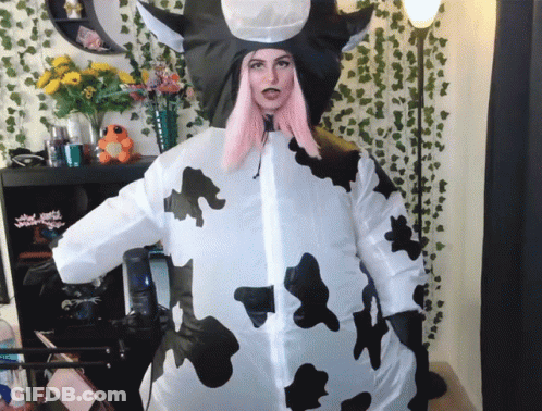 Green Mascot In Number 1 Shirt Dancing On Baseball Field GIF
