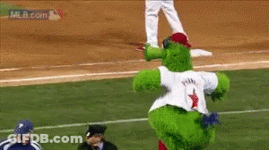 Green Mascot Number 1 Dancing On Baseball Field GIF