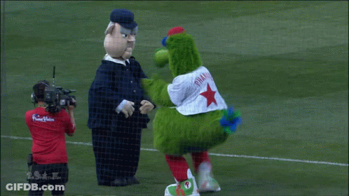 Green Mascot With Red Star GIF