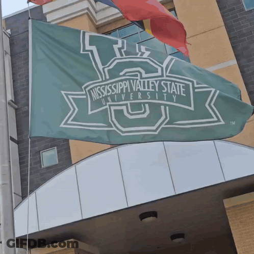 Green Mississippi Valley State University Flag Hanging From Pole GIF