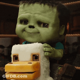 Green Monster Holding Stuffed Duck GIF