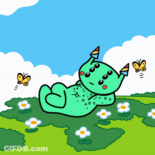 Green Monster Laying In Grass GIF