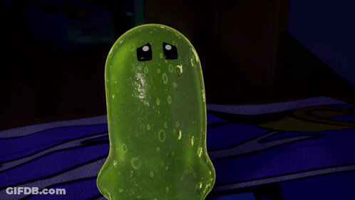 Green Pickle Sad Face On Blue Blanket GIF