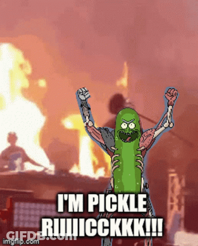 Green Pickle Sitting Next To Pencil GIF