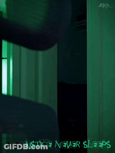 Green Poster Saying Justice Never Sleeps GIF