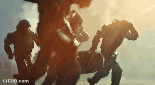 Green Power Ranger Holding Gun On Brick Sidewalk GIF
