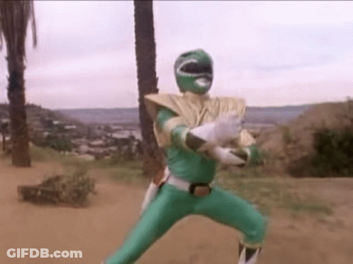 Green Ranger From Power Rangers Standing In Dirt GIF