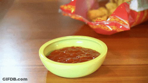 Green Salsa Bowl Next To Chips GIF