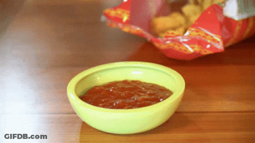 Green Salsa Bowl Next To Chips GIF