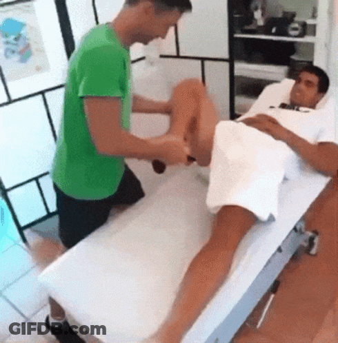 Green Shirt Kneeling Next To White Shirt Laying GIF