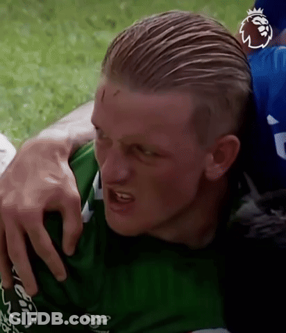 Green Shirt Man Hugged On Soccer Field GIF