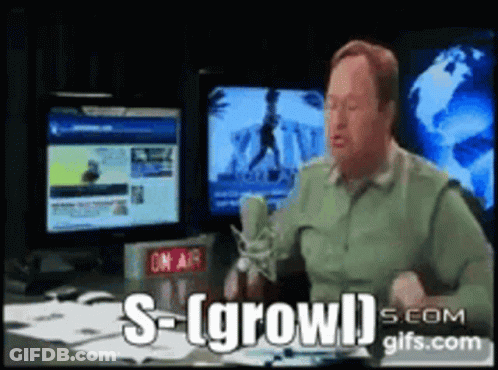 Green Shirt Man On Mic Says S Grow GIF
