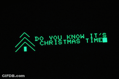 Green Sign Saying Do You Know It's Christmas Time GIF