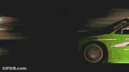 Green Sports Car Driving At Night GIF