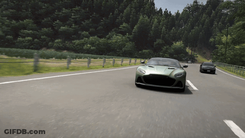 Green Sports Car Driving Down Road GIF