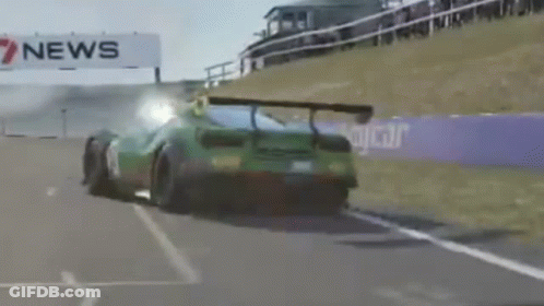 Green Sports Car On Race Track With 7 News Sign GIF
