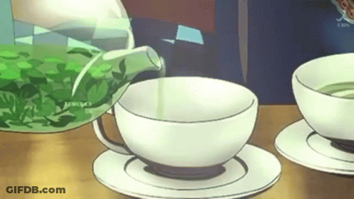 Green Tea Poured Into White Cup On Saucer GIF