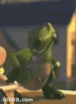 Green Toy Dinosaur Wearing Headphones GIF