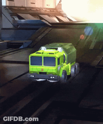 Green Truck With Transformer Logo Driving GIF