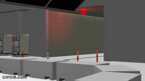 Green Van Parked In Warehouse With Red Light GIF
