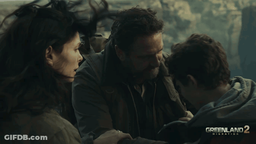 Greenland 2 Migration Movie Poster Three People Hugging GIF