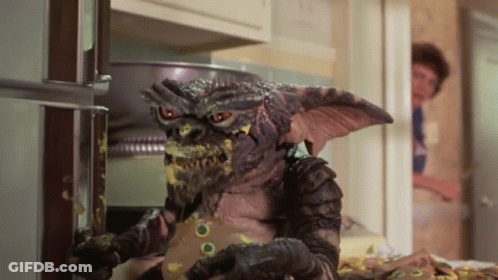 Gremlin Eating Cheese GIF