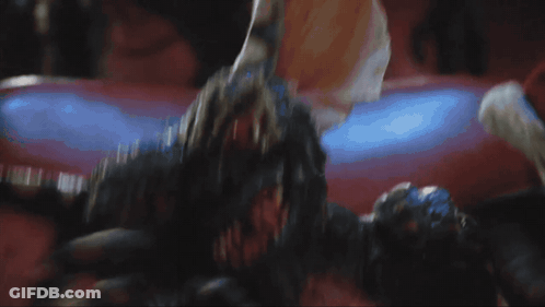 Gremlin Holding Bag That Says T8 GIF