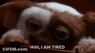 Gremlin Peeking Out Saying I Am Tired GIF
