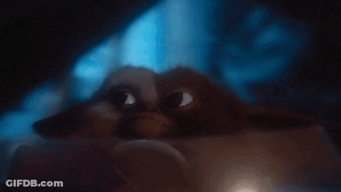 Gremlins Close Up Looking At Something GIF