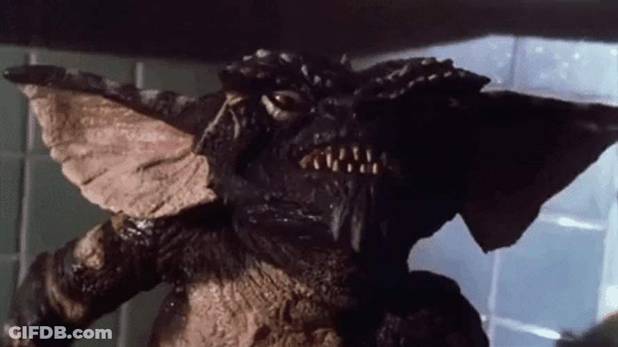 Gremlins Creepy Evil Bite GIF
